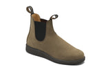 A single Chelsea-style ankle boot in taupe-brown suede with black elastic side panels and a black sole, shown on a plain white background.