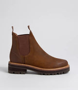 A brown leather Chelsea boot with a dark brown elastic side panel and a chunky lug sole, shown in profile against a light gray background.