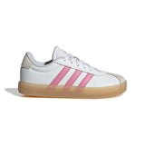 A white Adidas low-top sneaker with three pink stripes, a beige heel tab, and a translucent gum sole, shown in a side profile on a white background.