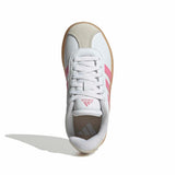 A single Adidas sneaker shown from a top-down view on a white background. The shoe is primarily white with pink stripes and a light beige toe cap, featuring a gum-colored outsole.