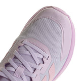 Close-up of a light purple athletic shoe showing the textured mesh upper, laces, and a portion of the sole against a white background.
