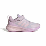 A light purple and pink toddler running shoe with a hook-and-loop strap closure, shown in a side profile on a white background.