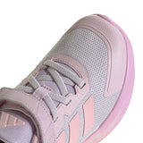 A close-up of a light purple and pink athletic shoe, showing the side profile with mesh upper, laces, and a textured sole on a white background.