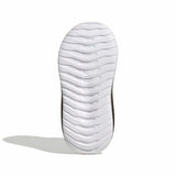 Close-up of a white shoe sole with wavy pattern on a white background