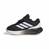 Black and white Adidas running shoe on a white background