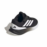 Black and white Adidas shoe on a white background