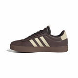 Brown Adidas sneaker with three white stripes on a white background