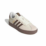 White and brown Adidas sneaker on a white background