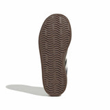 Close-up of an Adidas shoe sole on a light gray background