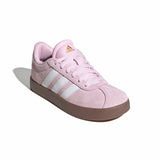 A light pink Adidas platform sneaker with white three-stripes on a white background.