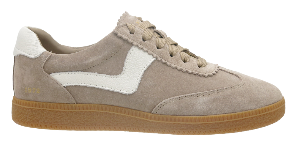 A light taupe suede sneaker with a white side stripe, beige laces, and a brown gum sole, shown from a side profile on a white background.