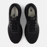 A pair of New Balance 530 running shoes in black, shown from a top-down view on a light gray background.